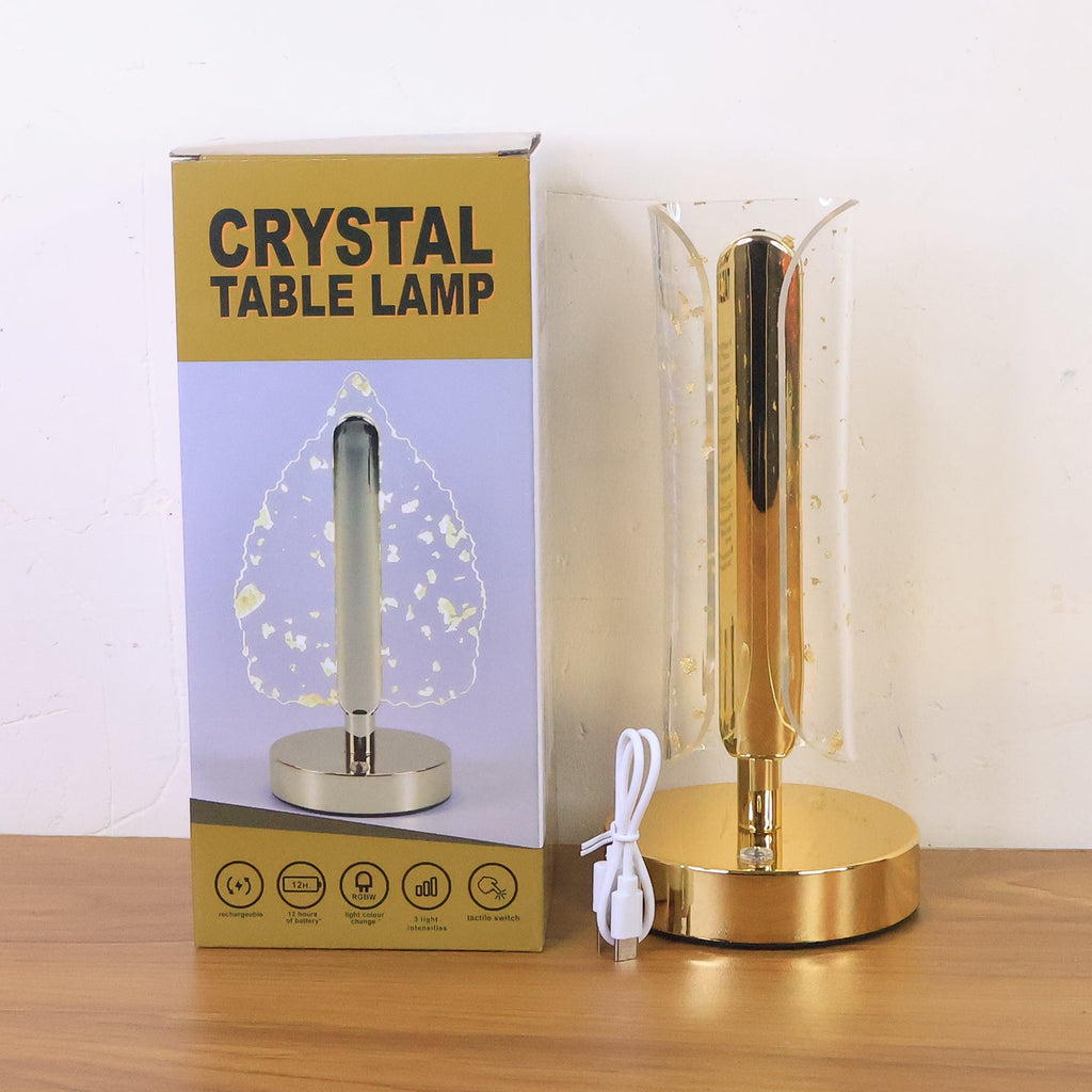 Glow of golden crystal table lamp enhancing living room décor with soft LED light