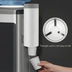 Close-up of dispenser showing cup dispensing slot