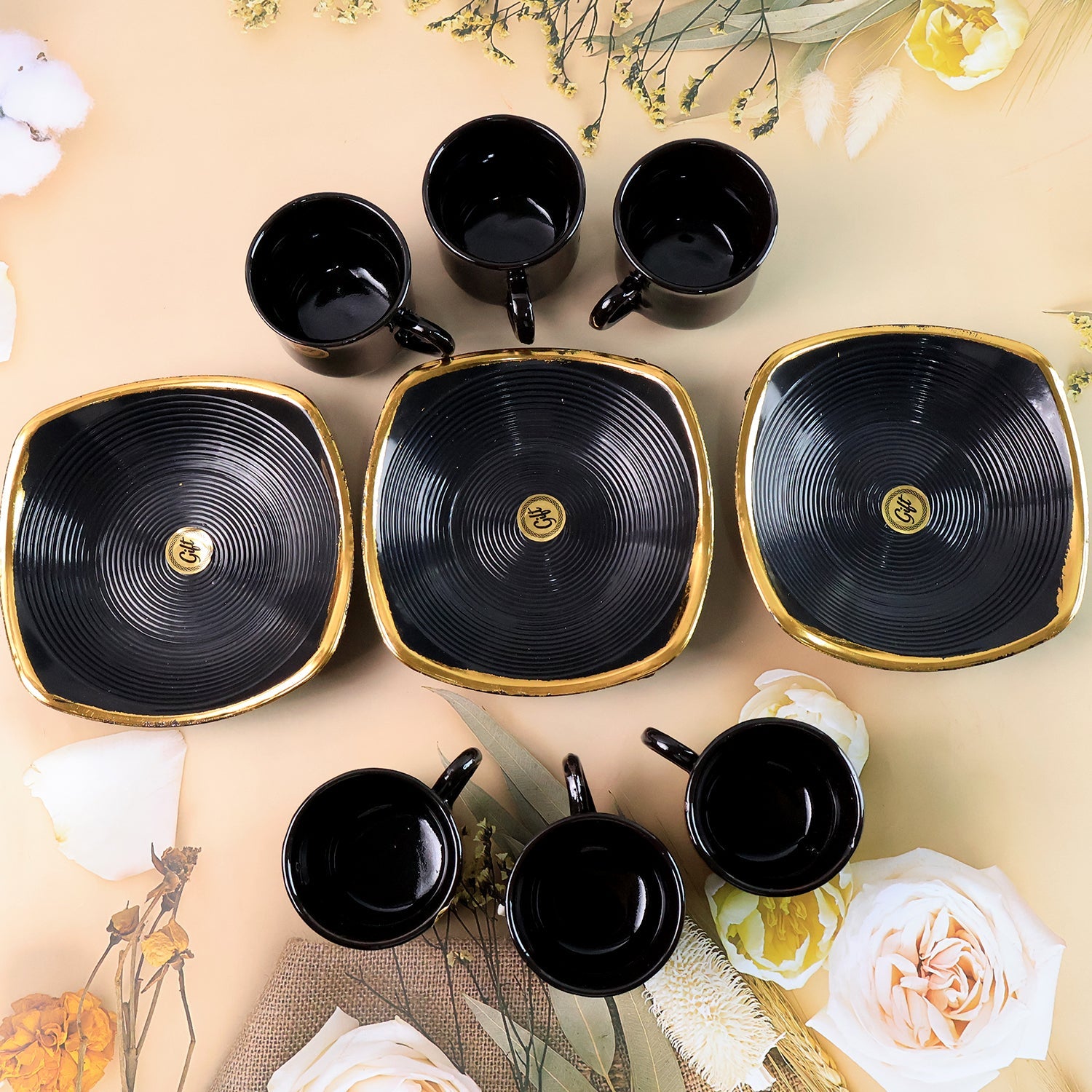 Nine-piece seashell ceramic cup and bowl set showcasing all components.