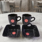 An individual Play Station ceramic coffee mug from the 4-piece set, highlighting its comfortable handle.