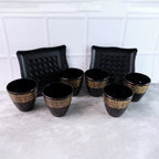 Complete 8-piece ceramic bowl and cup set elegantly displayed for dining.