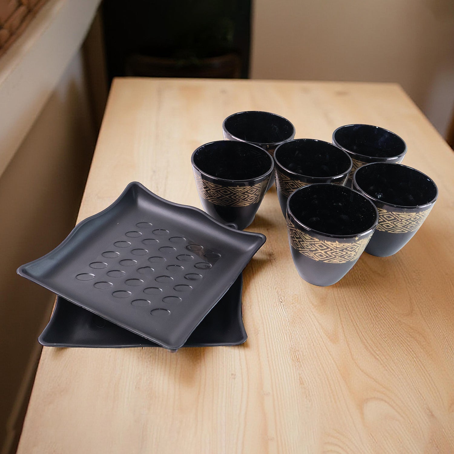 Overhead view of the full ceramic bowl and cup set, perfect for Indian tableware.