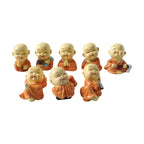 Smiling Mini Monk Buddha statue showing intricate craftsmanship
