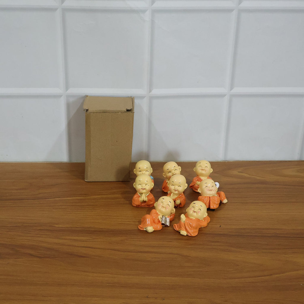 Mini Monk Buddha idol set arranged as peaceful decorative display