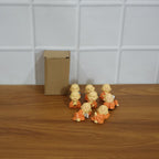 Mini Monk Buddha idol set arranged as peaceful decorative display