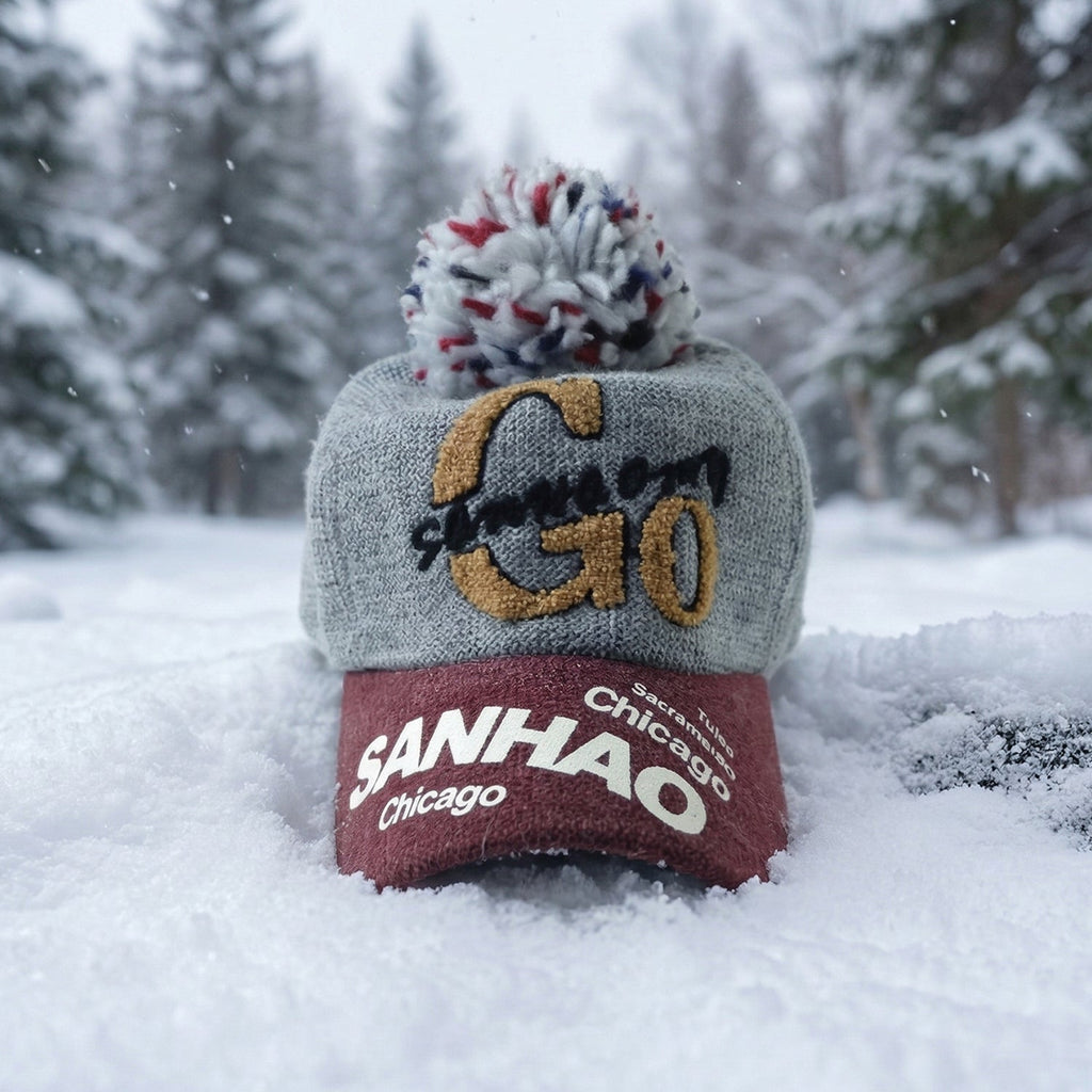 Display of woolen baseball cap with pom pom, casual winter style