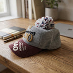 Texture and detail of woolen cap with pom pom for cold weather fashion