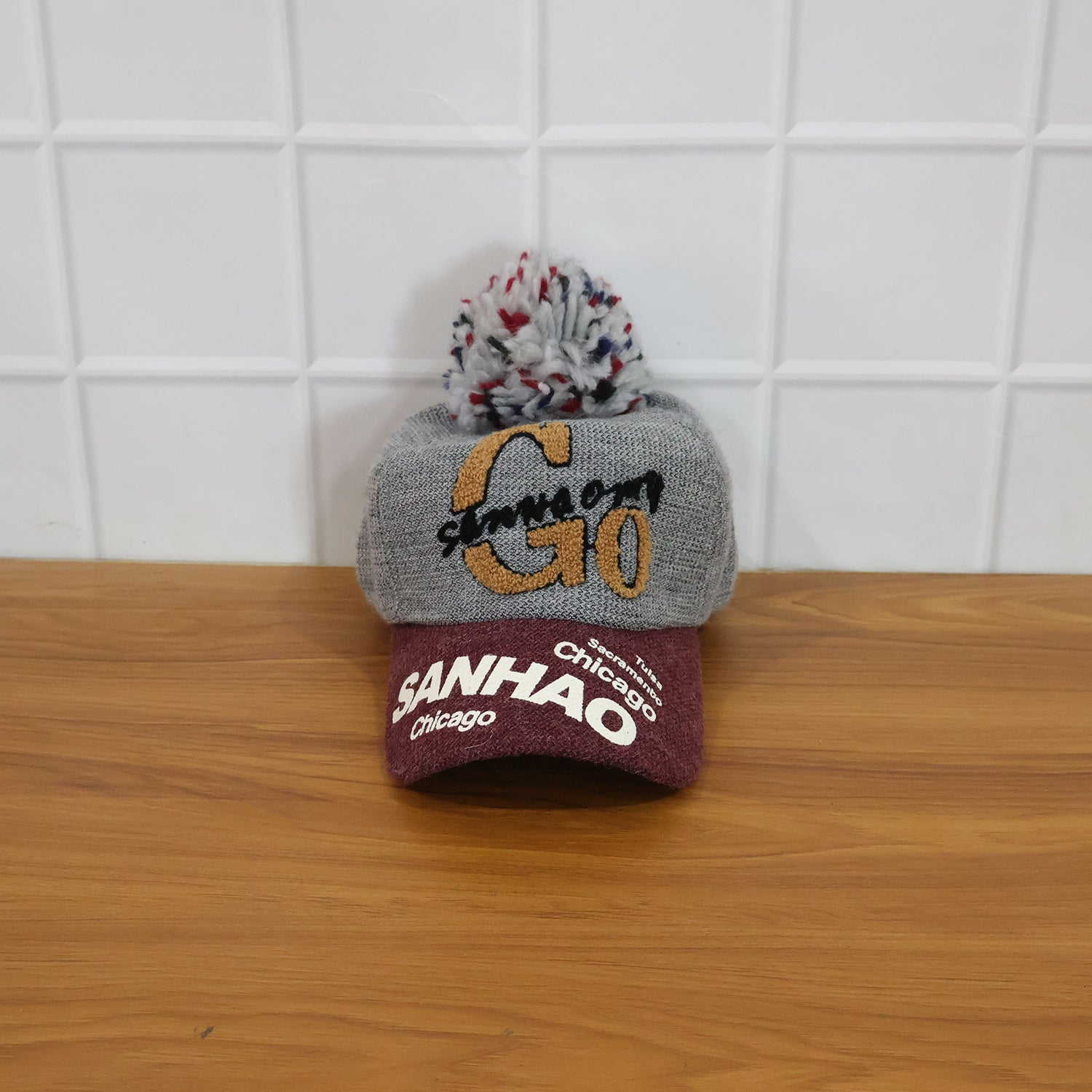 Lifestyle shot of woman wearing woolen baseball cap during winter