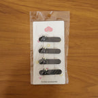 Hair clips styled in hair demonstrating secure hold