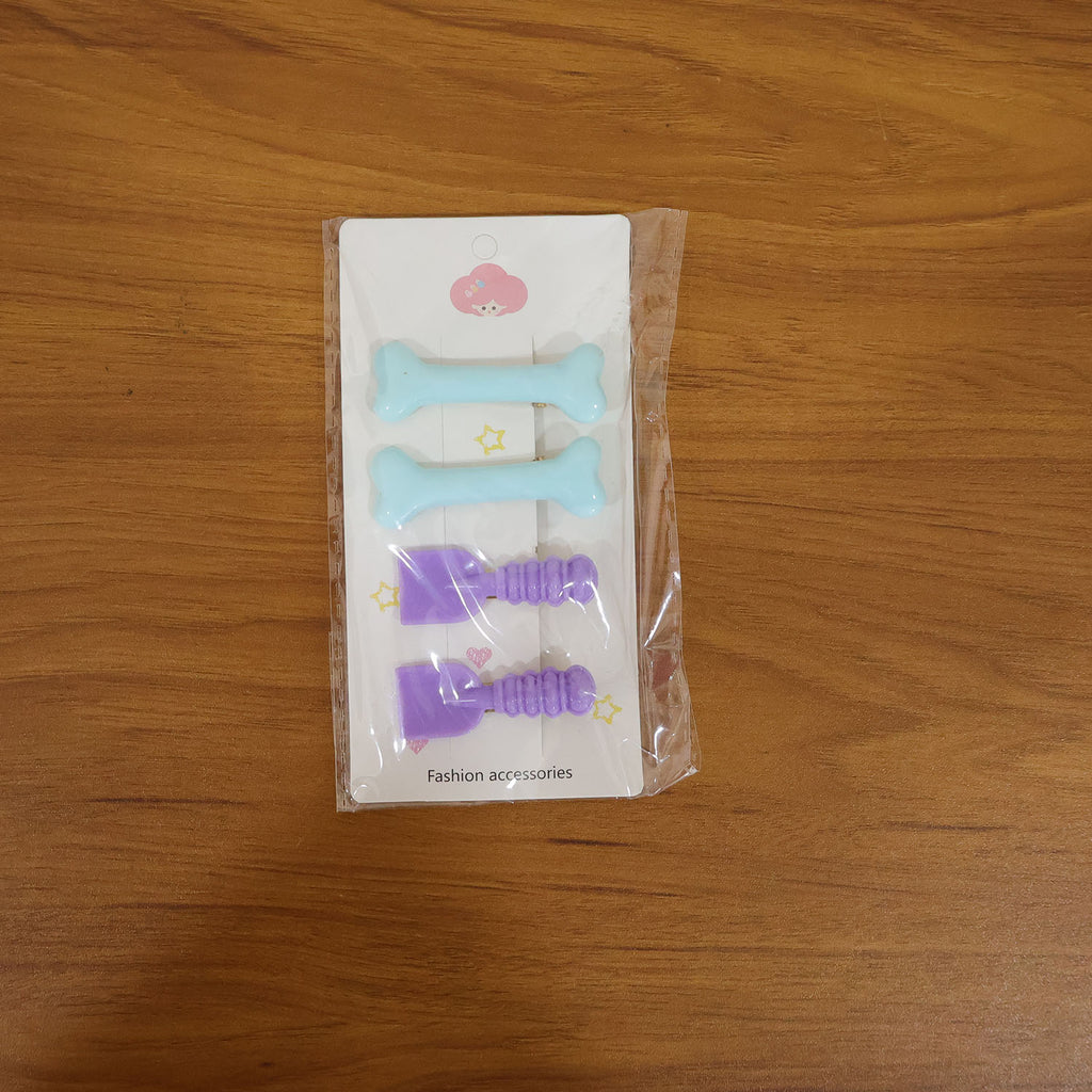 Child wearing cartoon hair clip set for playful hair styling