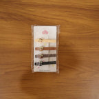 Lifestyle image featuring girls wearing cartoon cat design hair clips