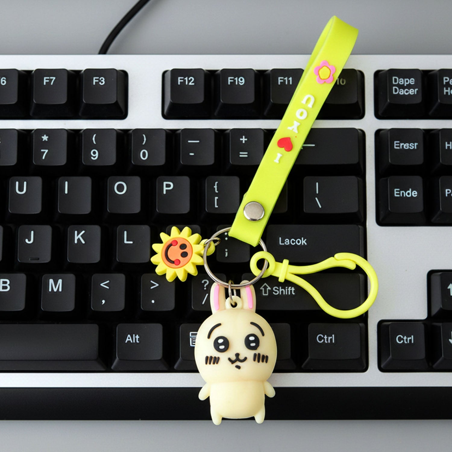 Soft silicone bunny keychain close-up showing smooth texture