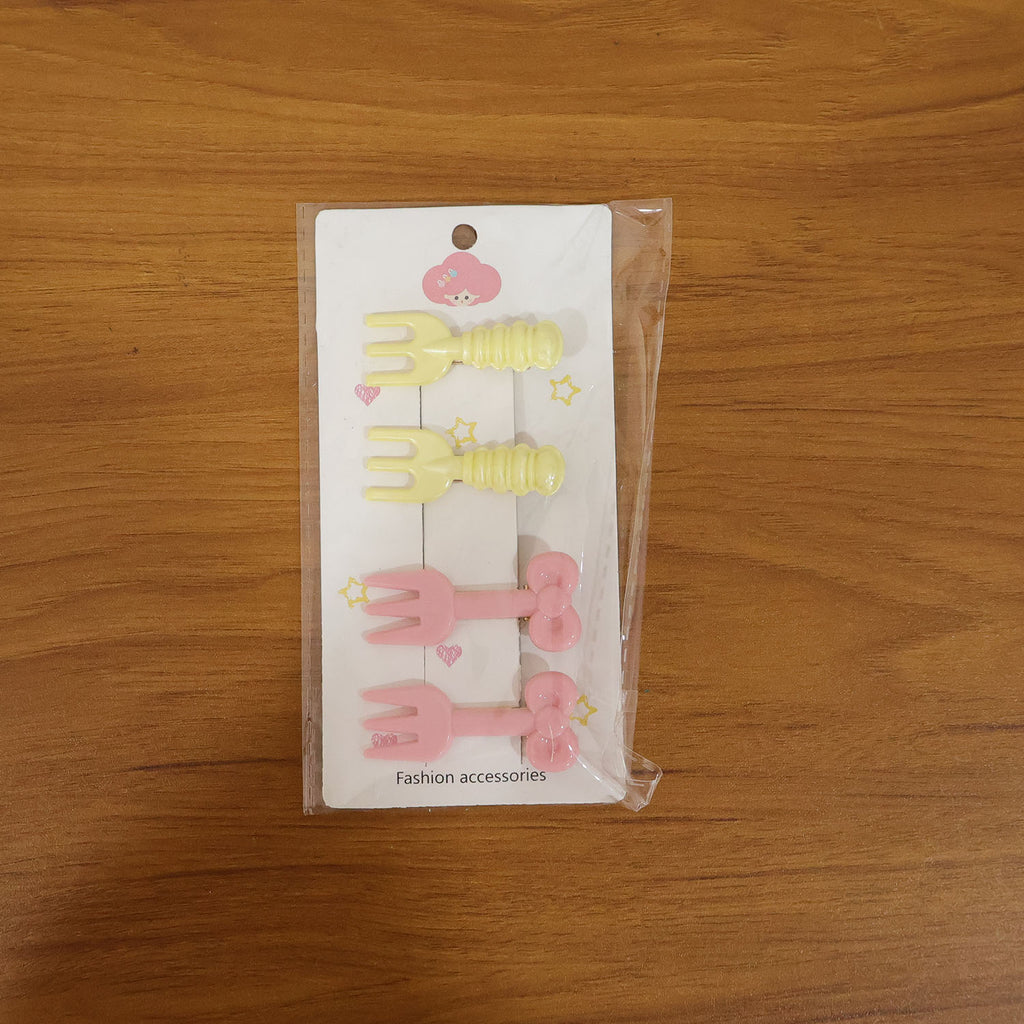 Mini fork hair clips used for styling hair in a casual look