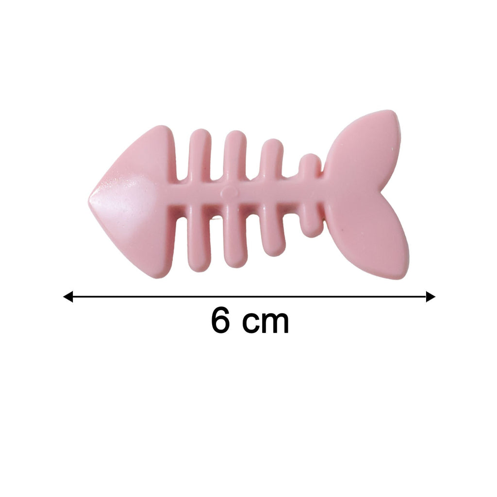 Cartoon hair clip displayed next to a ruler showing its compact size.