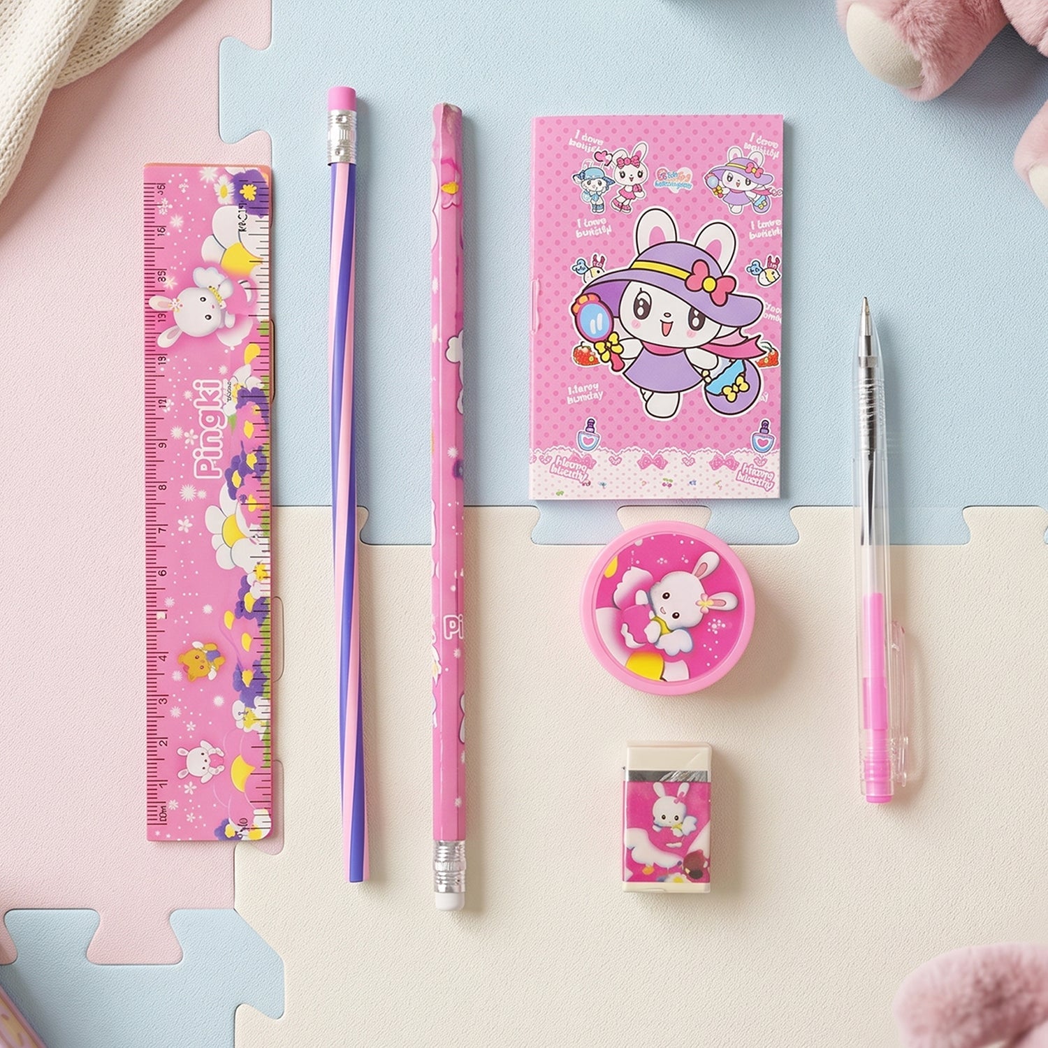 Kids study stationery kit featuring pen, sharpener, and fun character designs