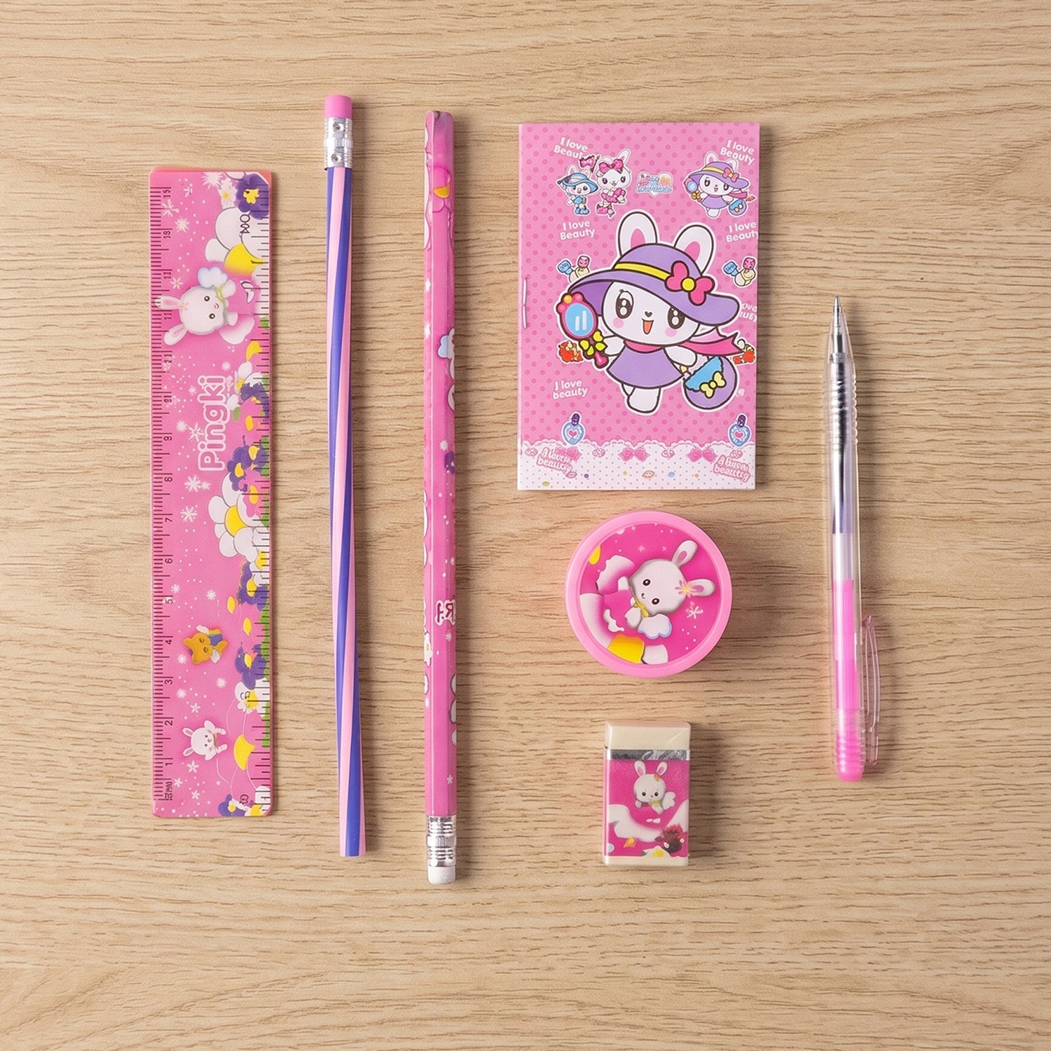 Packaging of the 7-in-1 pink kids stationery set