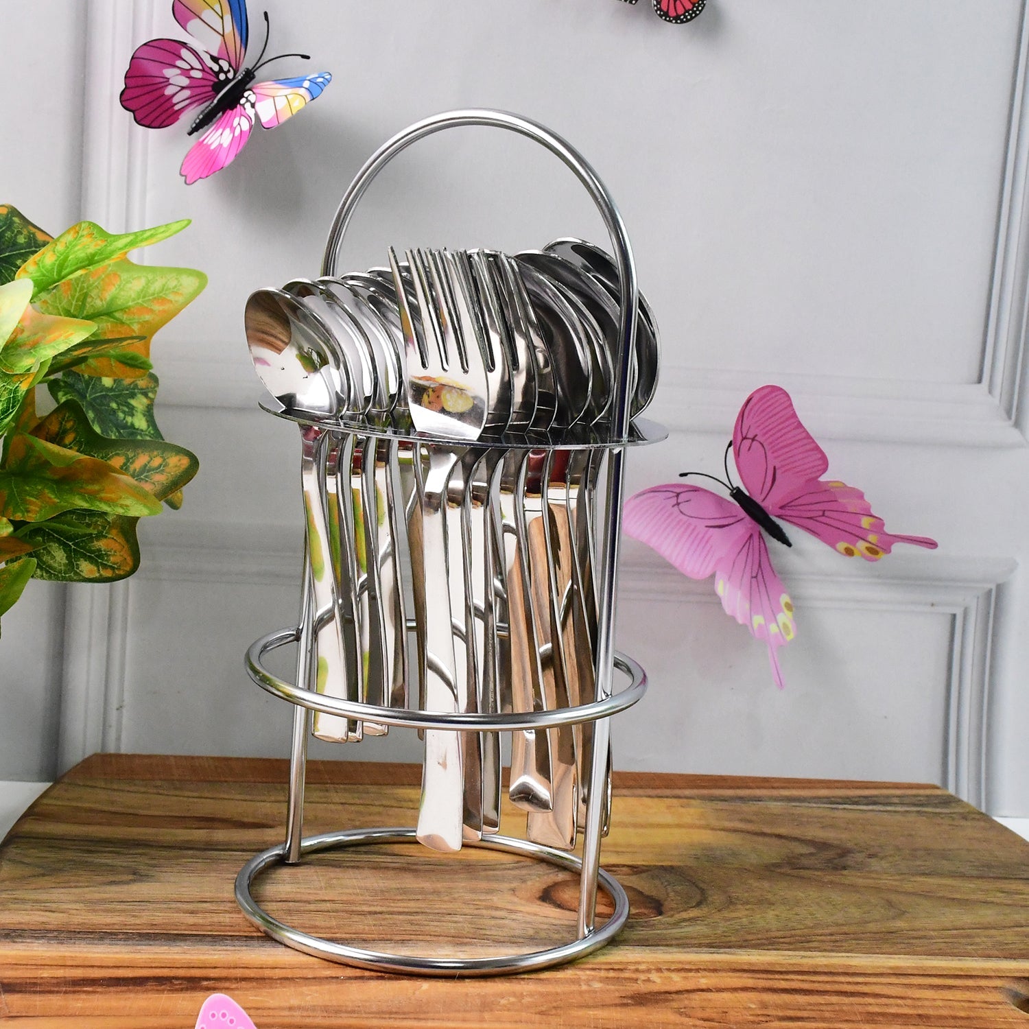 Side view showing polished stainless steel forks and spoons