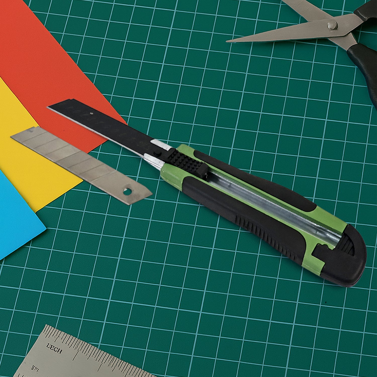 Close-up of cutter knife blade and ergonomic grip