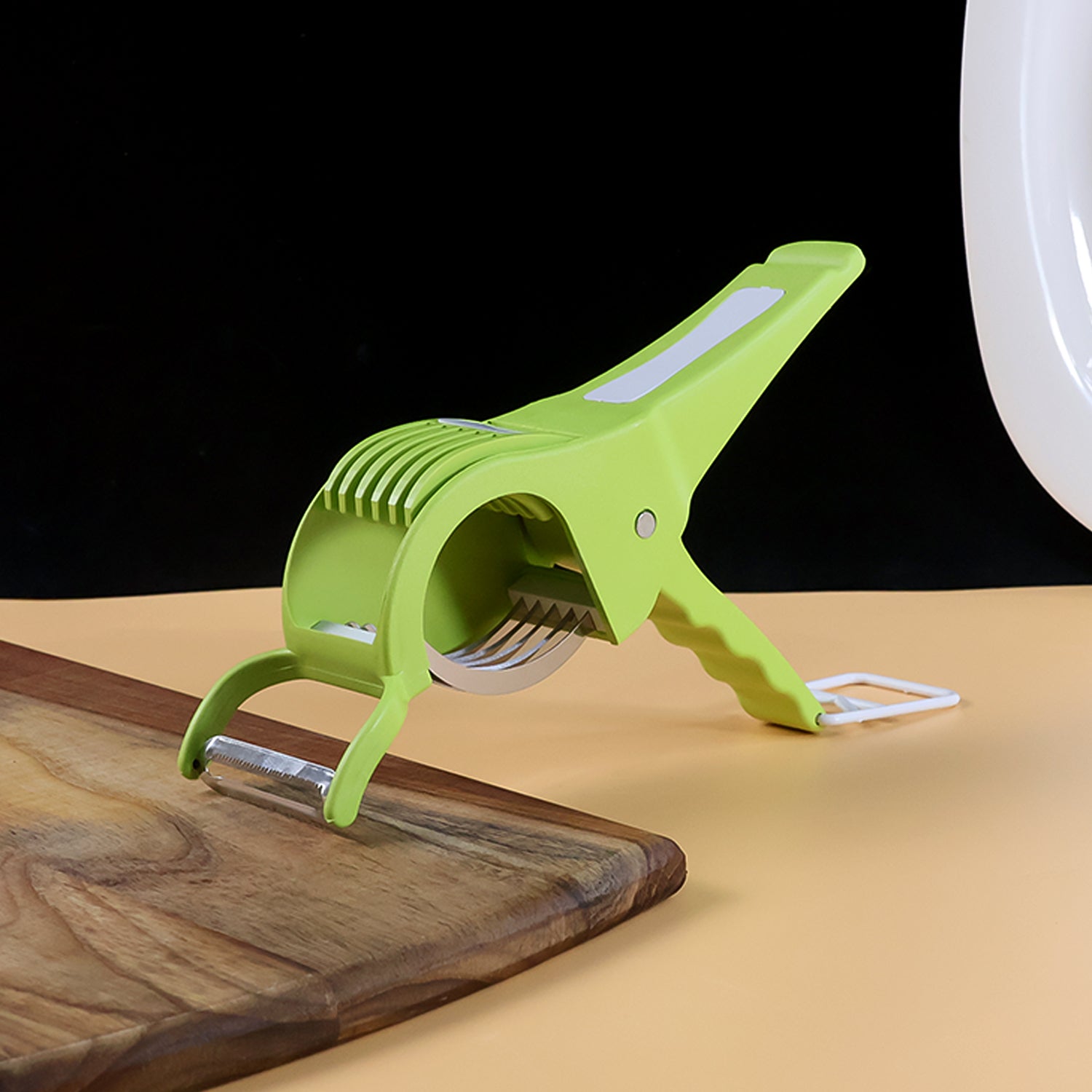 Quickslice Vegetable Cutter in action, effortlessly slicing fresh cucumbers for a healthy meal.