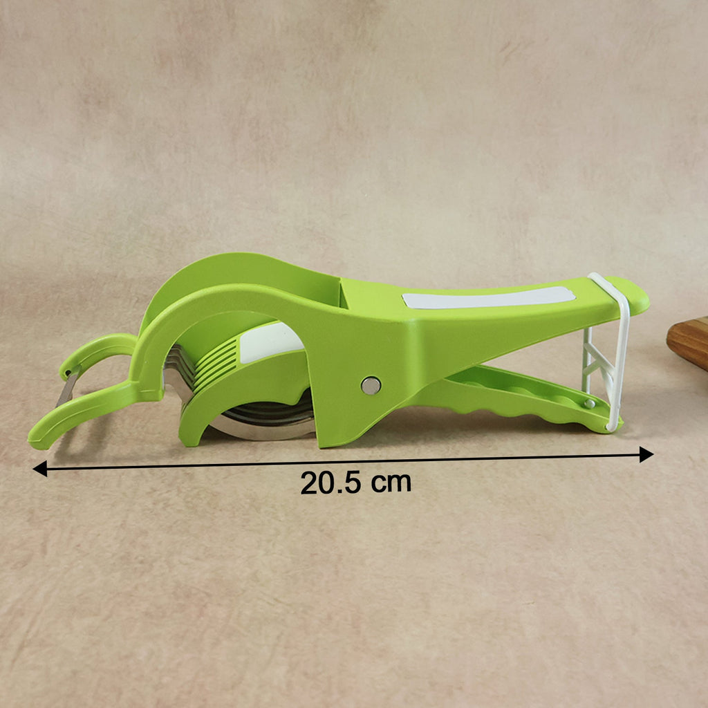 Multi-blade Quickslice Vegetable Cutter efficiently slicing carrots into uniform pieces.