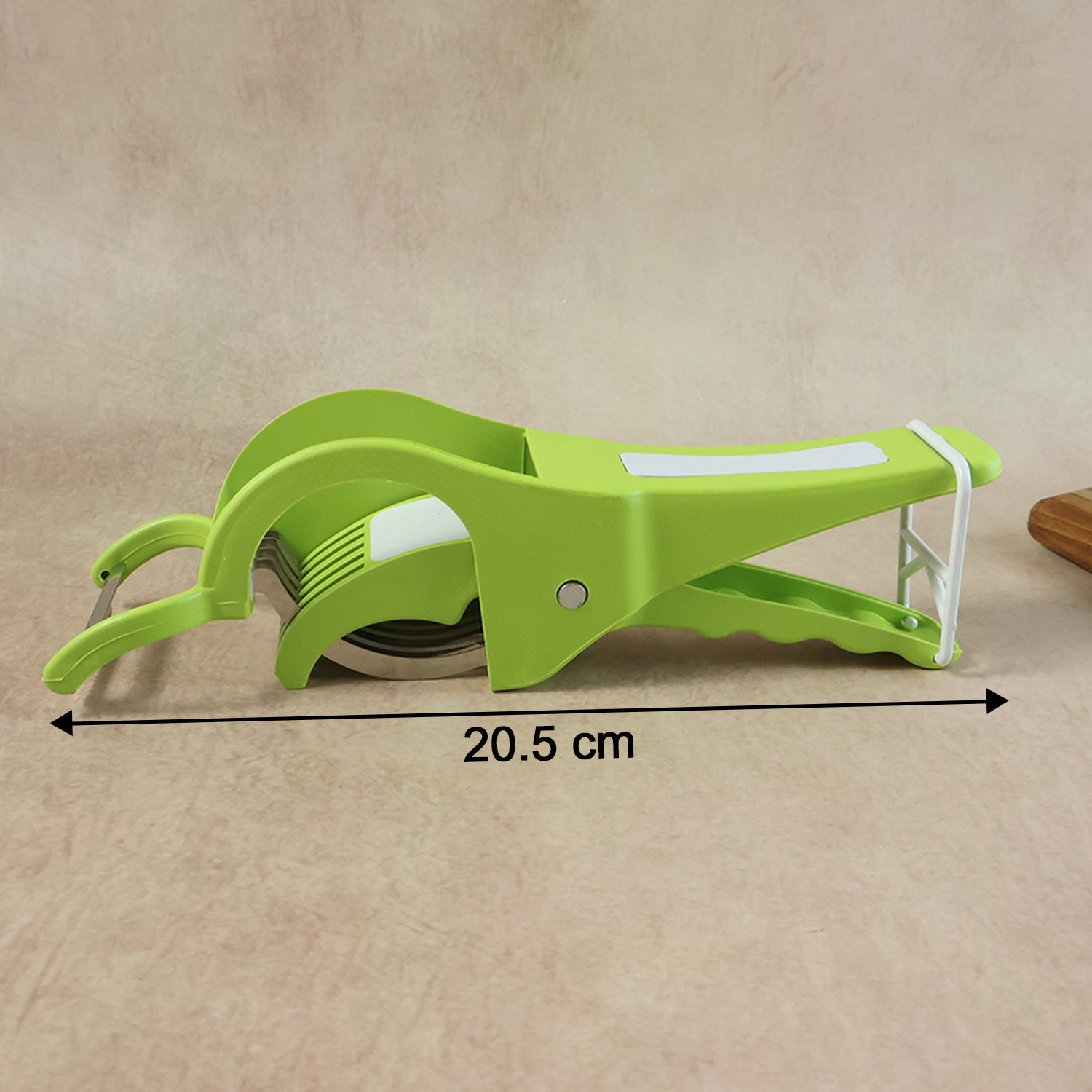 Multi-blade Quickslice Vegetable Cutter efficiently slicing carrots into uniform pieces.