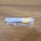Utility cutter knife shown in use cutting packaging material