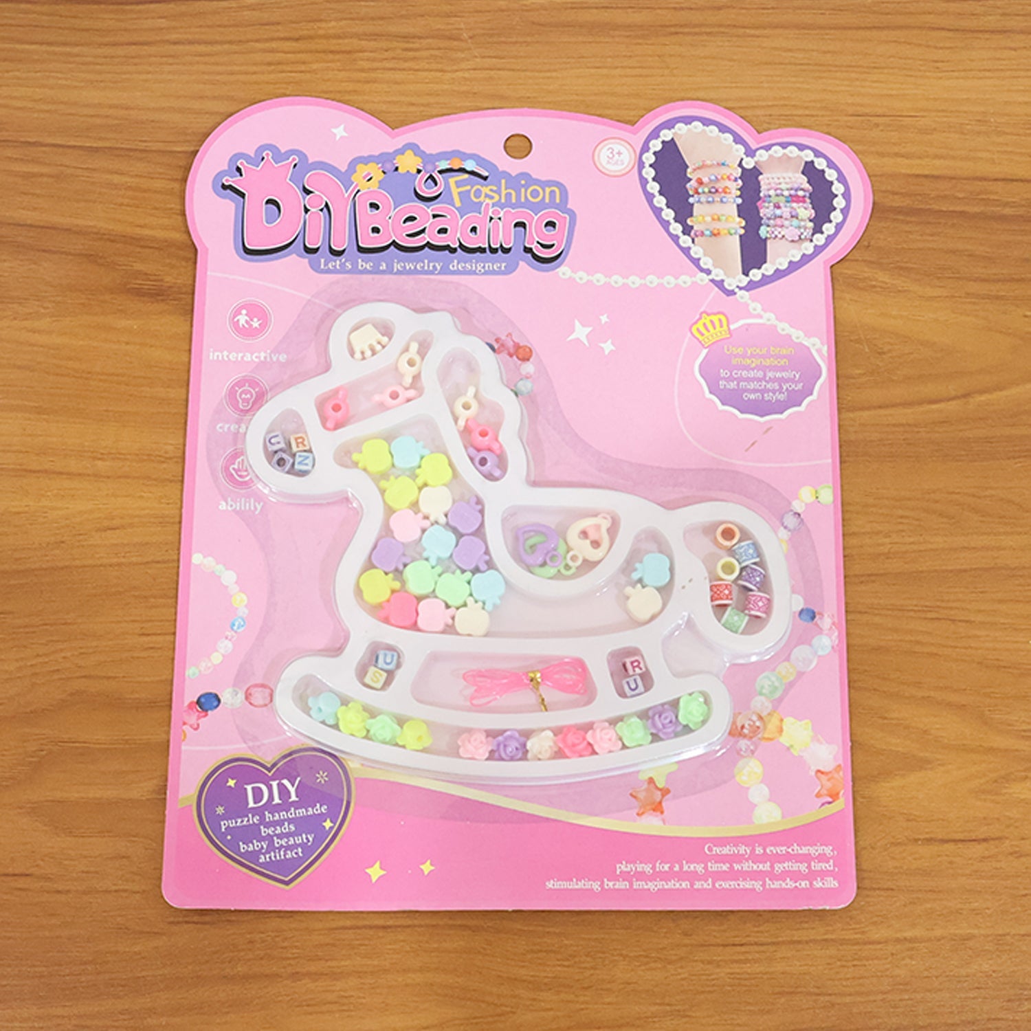 Children's creative beadwork kit including alphabet and flower beads with string