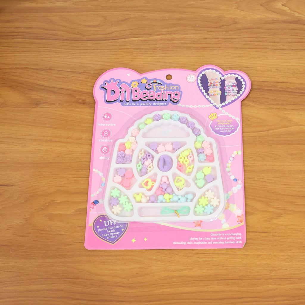 Kids enjoying creative play using the DIY fashion beading jewellery making kit