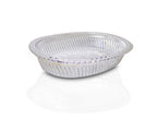 Close-up of a decorative oval silver tray with intricate royal patterns.