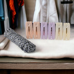 Cloth drying rope with clips hanging clothes securely outdoors