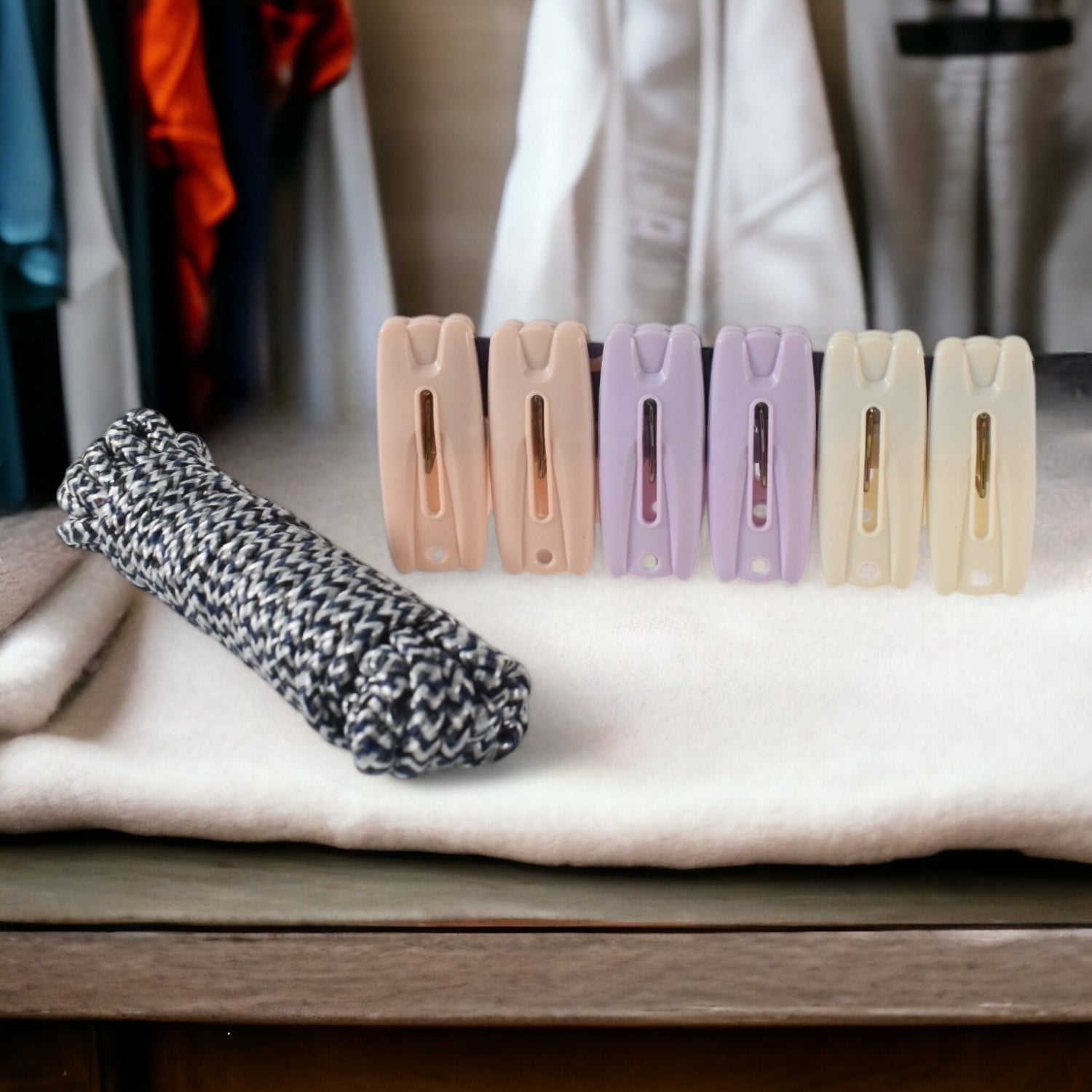 Cloth drying rope with clips hanging clothes securely outdoors