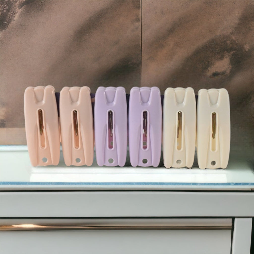 Close-up shot of durable cloth drying clips on rope