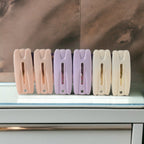 Close-up shot of durable cloth drying clips on rope