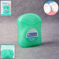 Pack of mint waxed dental floss with compact dispenser for easy oral care