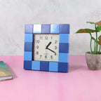 Angled view of the compact square table clock, ideal for small spaces.