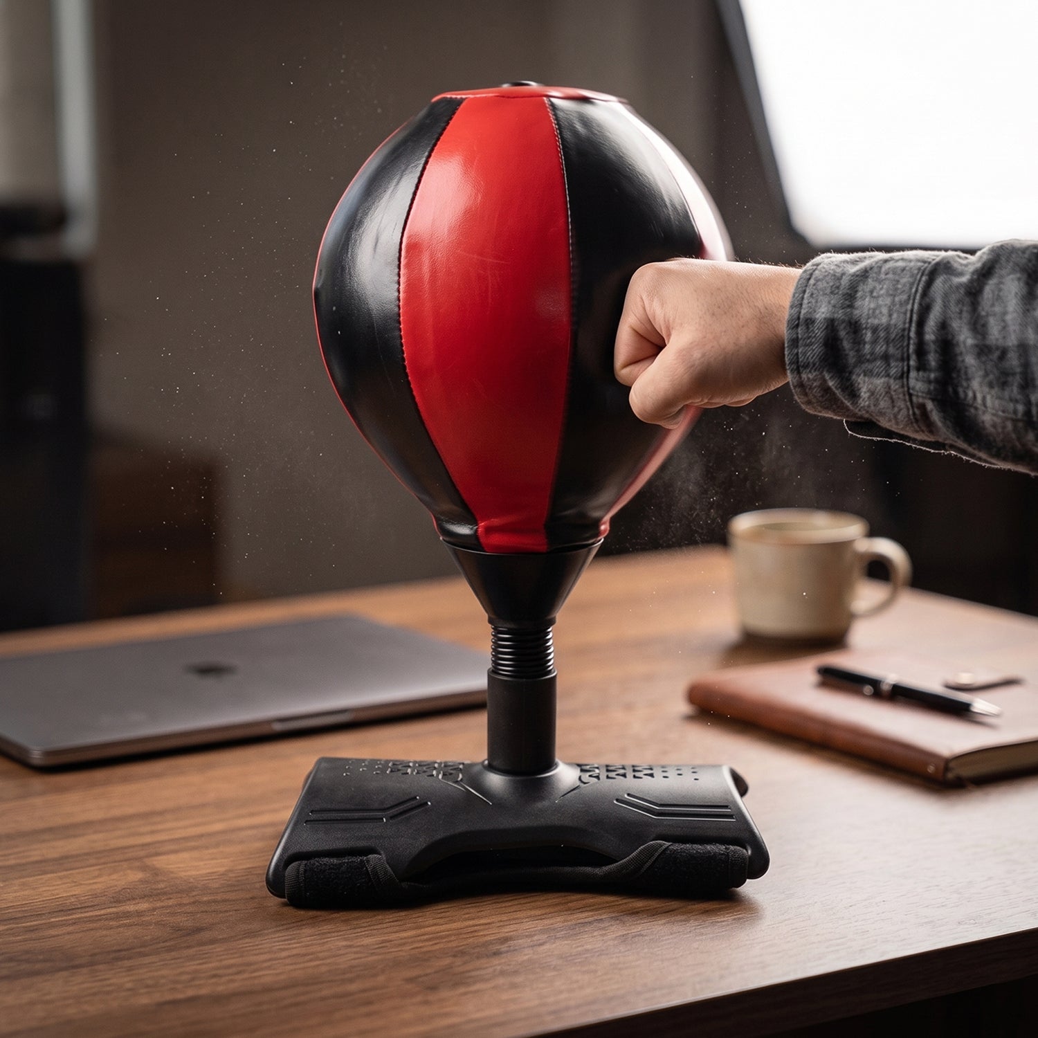 Durable inflatable punch bag with a sturdy base for quick rebound