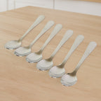 Close-up view of stainless steel dining spoons highlighting their sleek design