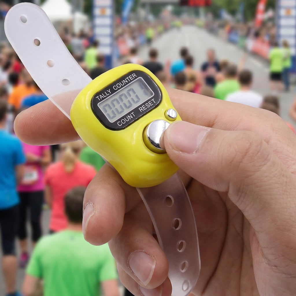Side angle of digital finger tally counter highlighting ergonomic design