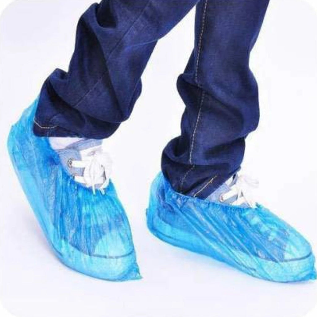 Disposable shoe covers in use on shoes