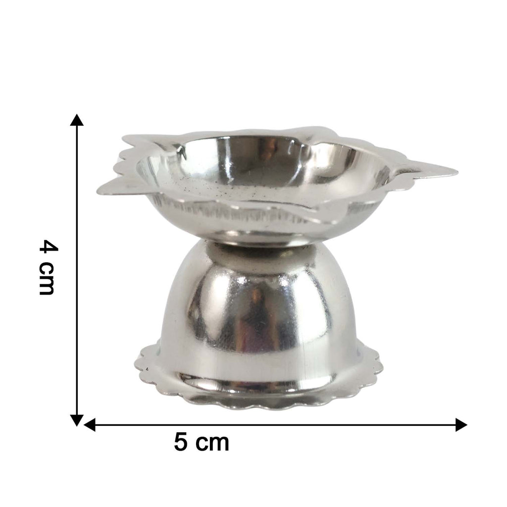 Spiritual pooja decoration featuring small sunflower steel diya stand