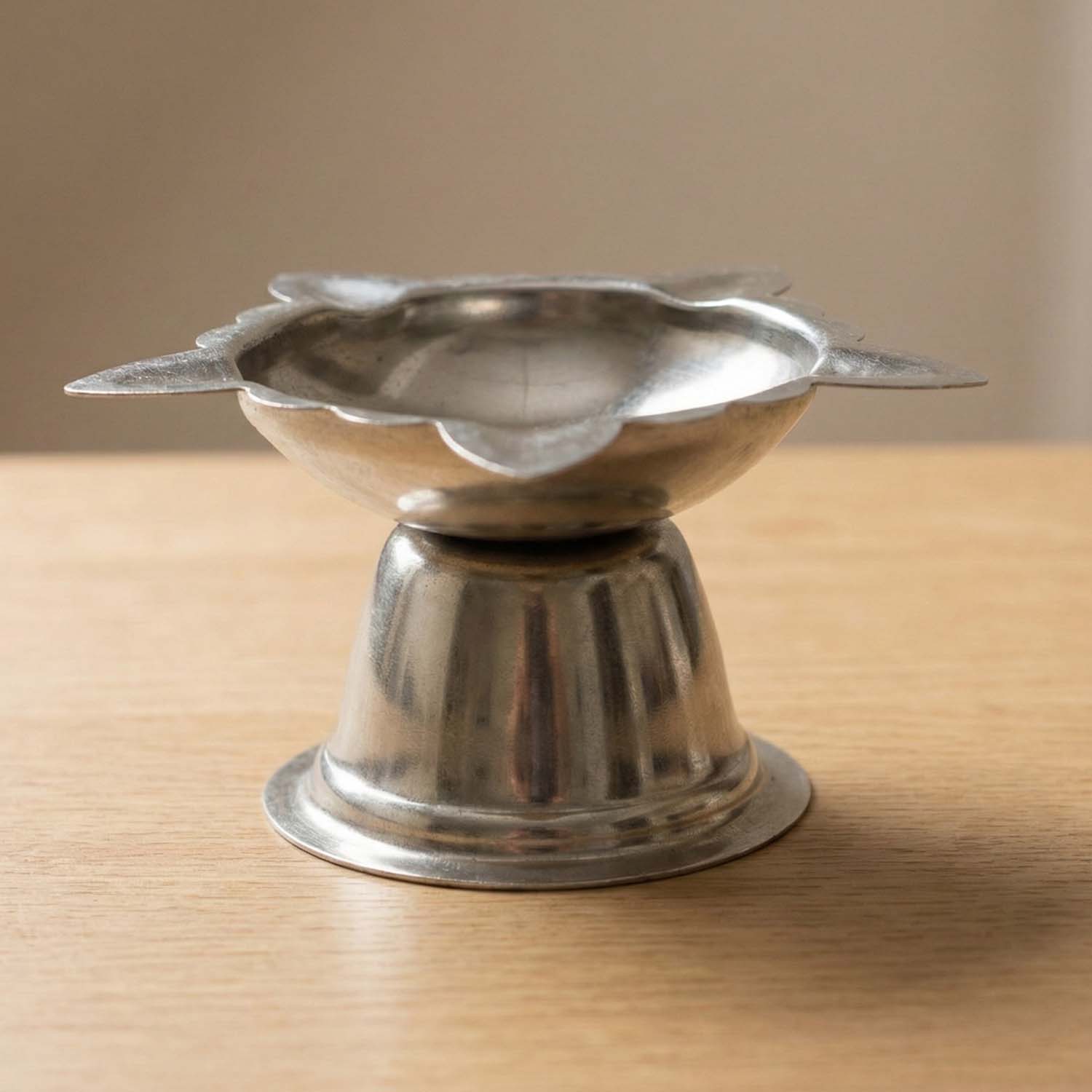 Durable and reusable steel diya holder for religious rituals