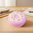 Side view of a colorful Donut Lunch Box, highlighting its depth.