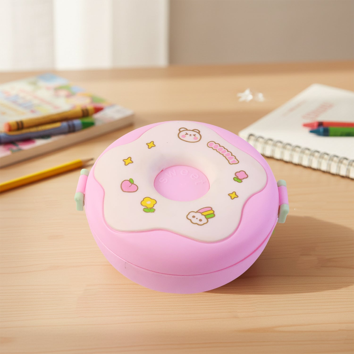 Side view of a colorful Donut Lunch Box, highlighting its depth.