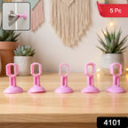 Close-up of silicone door stopper with suction base on smooth surface