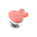 Cabinet pull knob with distinctive bunny ear shape in kids room setup