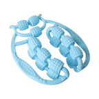 Close-up of textured rolling beads on double wheel muscle massager