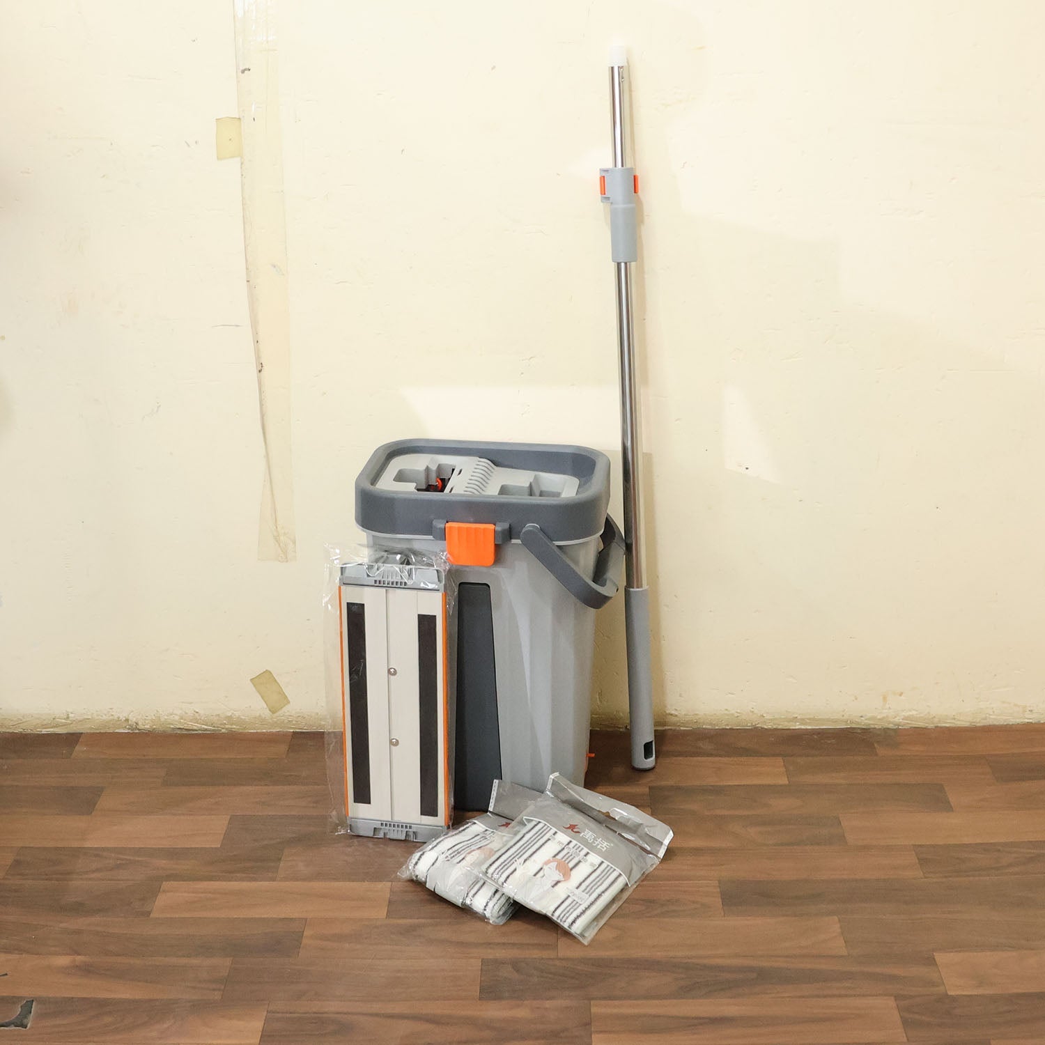 Complete small flat mop bucket cleaning set in use