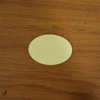 Round self-adhesive anti-slip furniture pad on surface