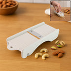 Dry fruit slicer with sharp stainless steel blade for almonds and ginger