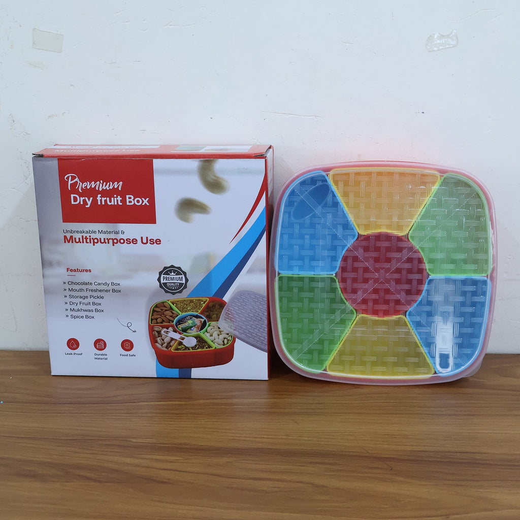 Lifestyle image of multipurpose dry fruit snack box in use with serving spoon
